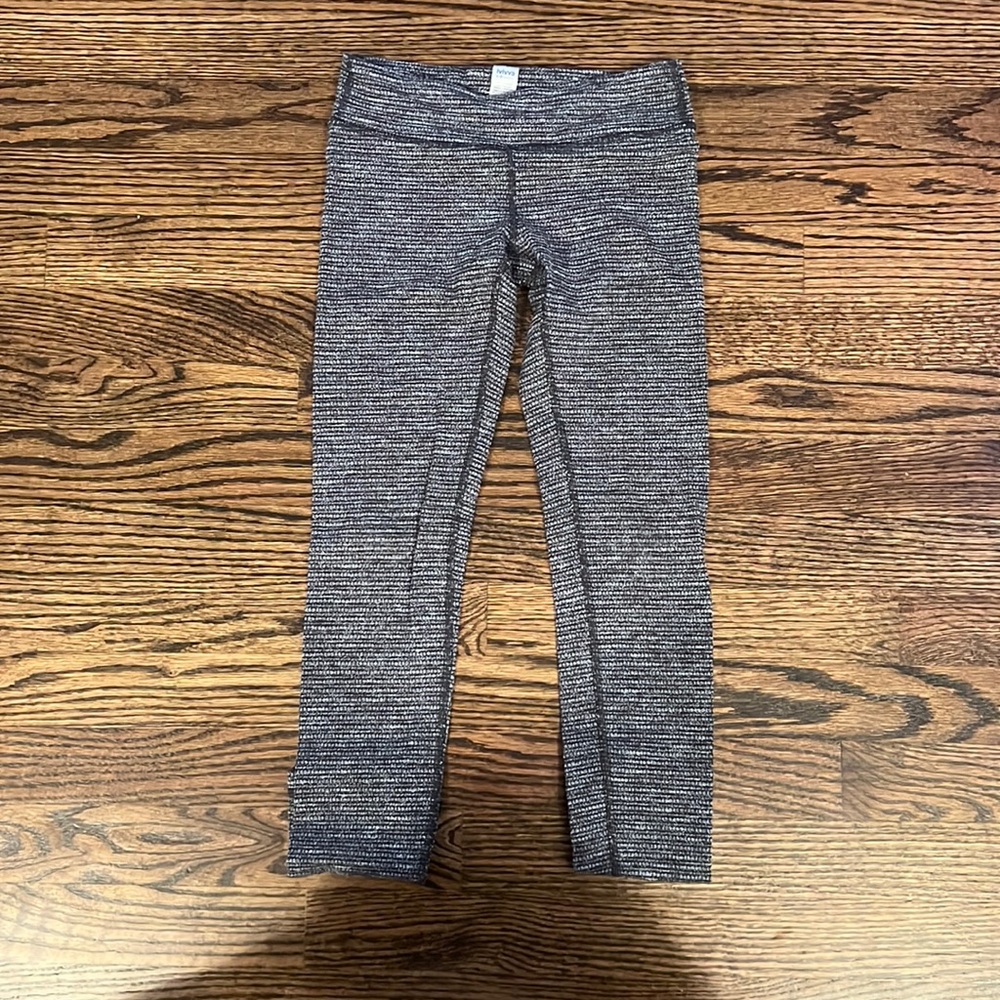 Adorable athletic leggings with a cute design by Ivivva size 8